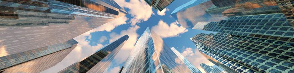 City skyscrapers from the point of view of a person looking up.